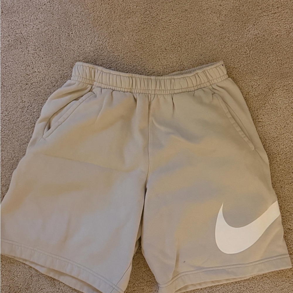 Nike Men’s Beige Athletic Shorts with White Swoosh